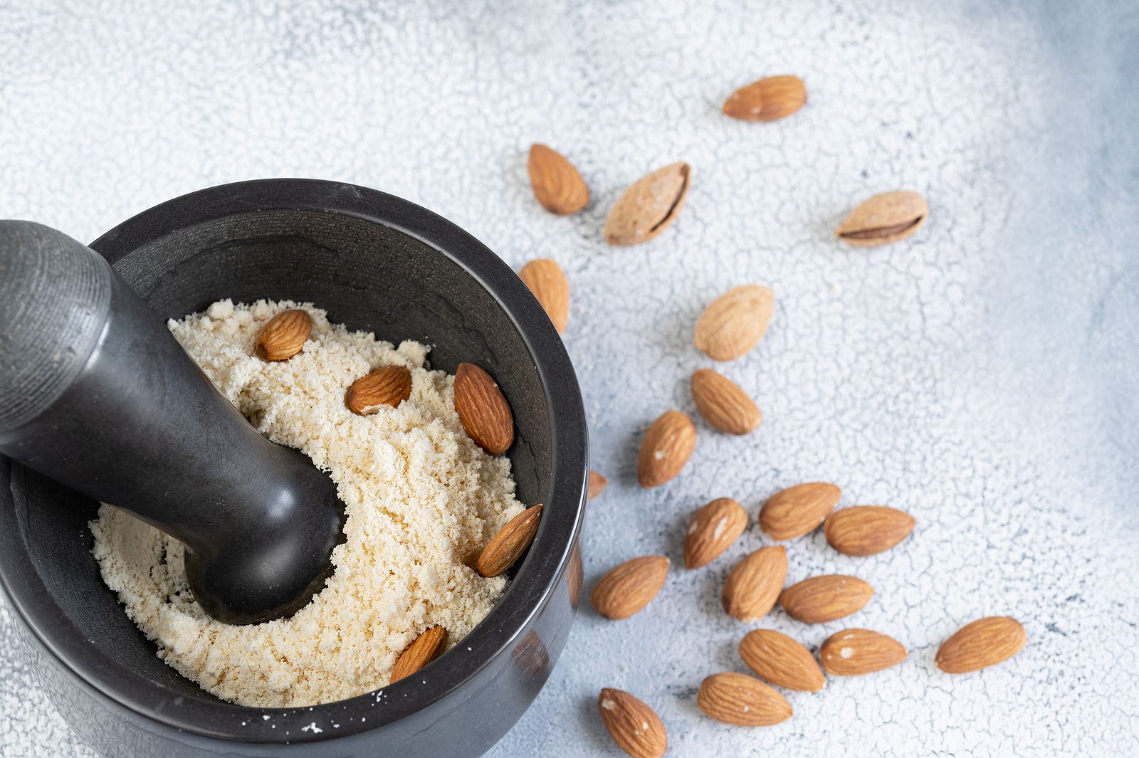 bigstock Almond Flour In A Stone Bowl  377371558