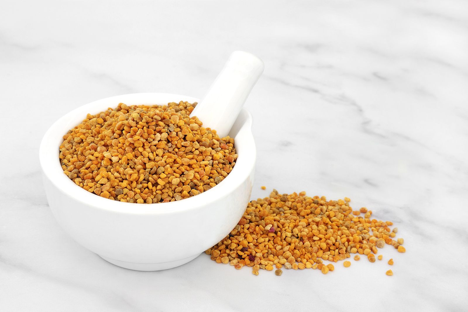bigstock Bee pollen in a mortar with pe 424120040