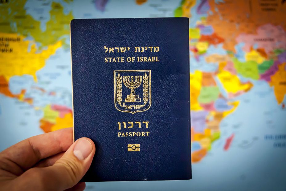 bigstock Hand Holding The Passport Of T 301733908