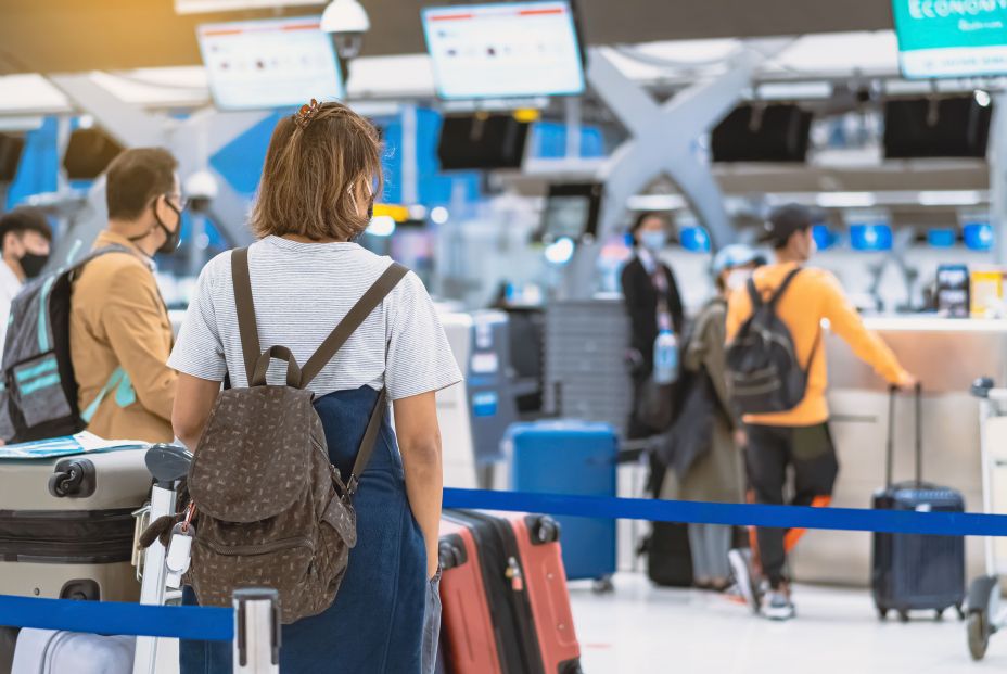 bigstock Back View Of Airline Passenger 426439127