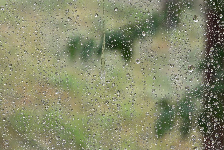 bigstock Raining Rain Drops On Window  430752326