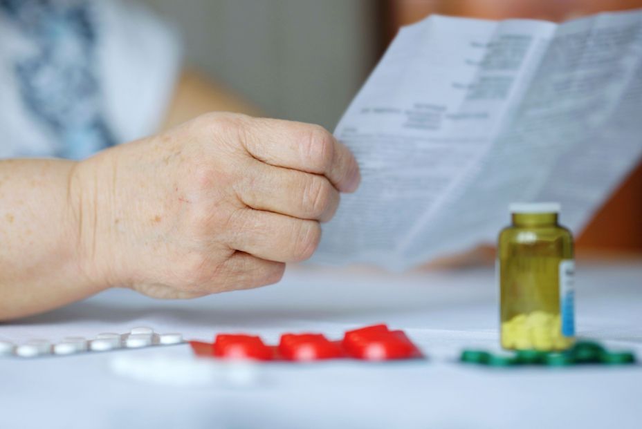 bigstock Hand Of Senior Woman Reading I 403342718