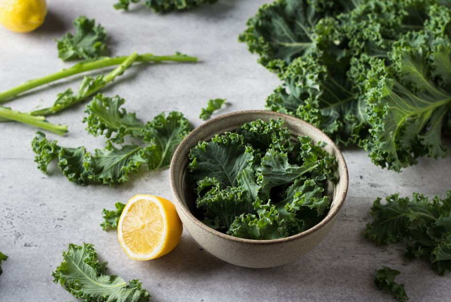 bigstock Fresh Torned Kale Leaves In A  433549739