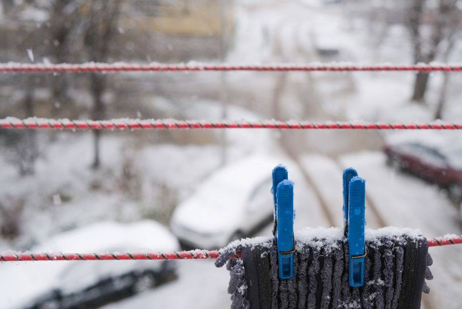 bigstock Snow On The Clothesline Cloth 443775473